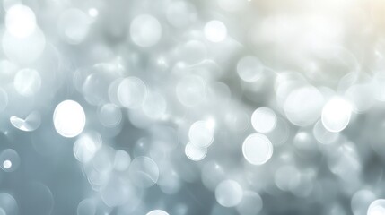 Wall Mural - Abstract bokeh background with soft light and white blurred circles.