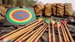 © Sumet - Colorful archery target with wooden arrows and quivers, perfect for outdoor sports and recreational activities.