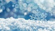 © stock.finder - Close-up of a frosted snowflake on snow with a sparkling bokeh background. Winter and Christmas concept.