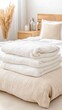 © ZinaZaval - A beige sweater lies unbuttoned on white sheets, its soft fabric slightly wrinkled and naturally illuminated, creating a calm and cozy atmosphere in the room