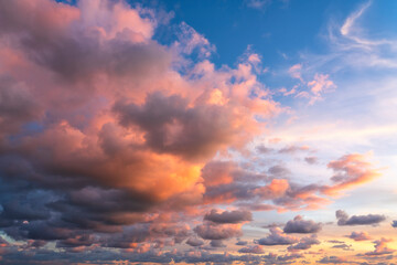 Wall Mural - Small clouds in dramatic real sky at sunset texture background overlay.