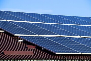 Solar electric panels on the roof of a residential building