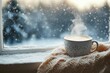 © MrHamster - Steaming Cup of Coffee on a Windowsill During a Snowy Day