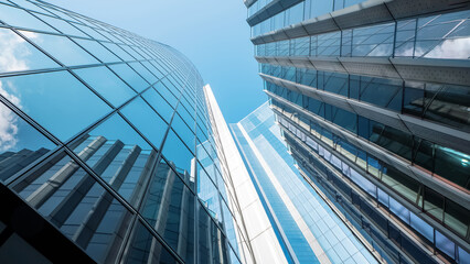 View of modern skyscrapers in a urban environment over the blue sky