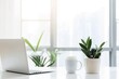 © Ben - Minimalist home office setup with a laptop and green plants on a white desk, creating a clean and bright workspace that promotes productivity and creativity., Generative AI