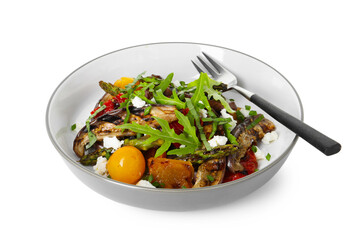 Sticker - Tasty salad with grilled vegetables and fork in bowl isolated on white