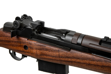 Classic semi-automatic rifle with a wooden stock and black metal parts isolated on a white back