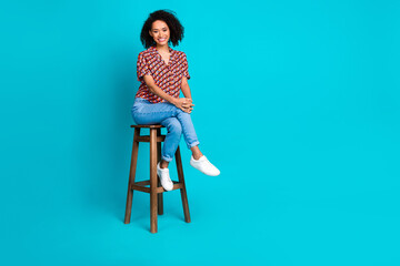 Wall Mural - Photo of lovely pretty girl sittingbar chair look isolated cyan color background