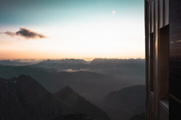 Wall Mural - Panorama of alps. Extreme sports in mountains. High resolution photo. Ski, parasailing, climbing, alpinism.