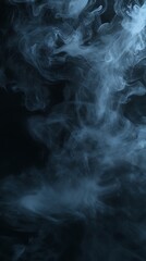 Wall Mural - Abstract fog drifts eerily across a deep, isolated black background image