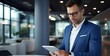 © acoustIcara - A professional man in a blue suit stands in a modern office, using a tablet, embodying a blend of business and technology.