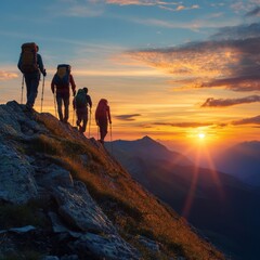 Sticker - Hikers silhouetted against a sunrise on a mountain ridge.