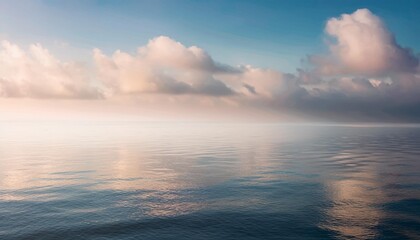 Wall Mural - mist over a calm ocean gentle reflections and soft tones 32k full ultra hd high resolution