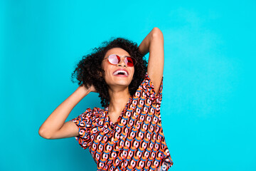 Poster - Photo of positive cheerful girl hands head look good mood copyspace isolated cyan color background