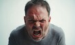 © Ninna Rodrigues - Furious and angry man displaying an aggressive and mad expression