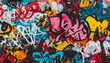 © mai - A wall filled with bold, colorful graffiti tags and street art, giving an edgy, urban feel full of energy