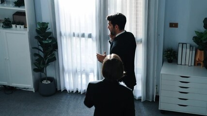 Wall Mural - Top view of smart male leader calling phone while project manager give financial document. Businessman talking to investor to brainstorm idea by phone while looking at data analysis. Directorate.