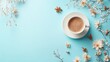 © Anat art - A cozy good morning wish paired with aromatic coffee and delicate flowers creates a serene start to the day against a light blue backdrop. Generative AI