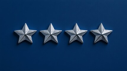 Fototapete - Four silver stars are arranged in a straight line against a blue background, creating a striking visual contrast. The texture of the stars adds depth and interest to the simple composition.