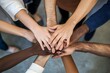 © DavidGalih | Dikomo. - Diverse team showing unity with a hands stack