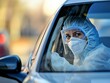 © Ryzhkov - Female Mid-Aged Healthcare Worker in Protective Gear Inside Parked Car at Clinic During Daytime Virus Epidemic - Demonstrating Containment Efforts