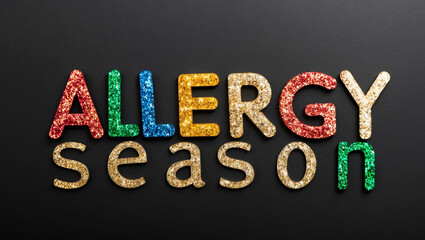 allergy season word lettering made of colorful glitter shining effect on plain black background