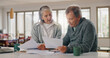 © WesLens/peopleimages.com - Senior couple, documents and budget planning with finance for pension, investment or expenses at home. Elderly, man and woman with paperwork for bills, funding or payments together on table at house