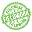 © outchill - FIELDWORK text on green round stamp sign