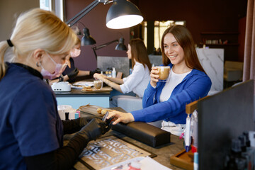 Female client getting high quality service at nail studio