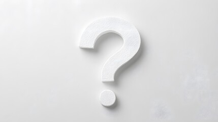 Large white question mark on light marble background symbolizing inquiry