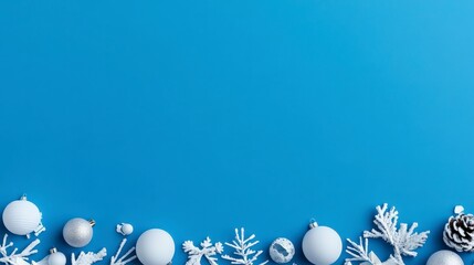festive blue holiday background with white ornaments and decor elements
