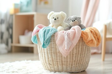 Aufkleber - Bright children's clothes and plush toys fill a laundry basket in a sunlit room, creating a cheerful, cozy atmosphere. Generative AI