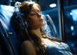 © Vadim - A woman is sleeping with headphones on. The headphones are connected to a machine. The woman is wearing a blue shirt