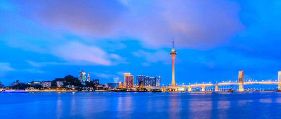 Macau skyline with modern city buildings scenery at night. Famous travel destination. Panoramic view.