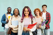 © EFStock - Portrait of hispanic student girl together with college classmate friends. Smiling students standing on university blue wall