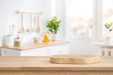 Wall Mural - podium or cutting board on wooden table on defocused rustic kitchen bench interior background