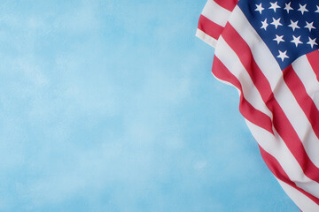 American flag on blue background with copy space.