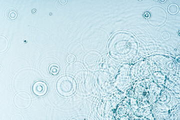 Poster - gentle ripples form on a serene blue surface