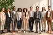 © Leo Rohmann - Group of professional men and women standing together in business attire symbolizing teamwork leadership and modern corporate culture in a clean professional setting