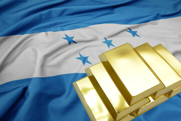 Wall Mural - shining golden bullions on the honduras flag background.