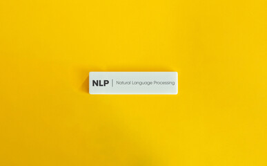 Wall Mural - NLP, Natural Language Learning. Text on Block Letter Tile on Yellow Background. Minimal Aesthetic.