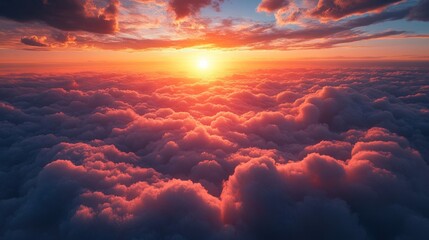 Canvas Print - A breathtaking view of the sun setting over a sea of clouds, painting the sky with vibrant hues of orange and pink.