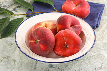 Wall Mural - Ripe sweet and juicy Flat peach