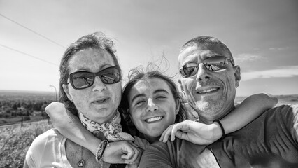 Poster - Happy family of three people take selfie outdoor