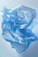 Poster - A close-up shot of a blue plastic bag with details on the texture and color