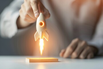 Poster - A person grasping a toy rocket, perfect for illustrations, cartoons, or educational materials