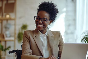 A Young Professional Woman in a Suit Smiles While Working on Her Laptop in a Bright, Modern Office During the Afternoon