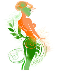 Wall Mural - A woman with a green and orange dress is standing in front of a leafy background. The woman is wearing a green top and a green skirt