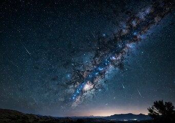 Wall Mural - the sky is filled with stars and a bright, glowing milky way