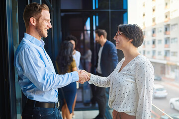 Canvas Print - Handshake, meeting and business people on office balcony for welcome, collaboration and partnership. Corporate, professional and man and woman shaking hands for agreement, b2b networking or thank you